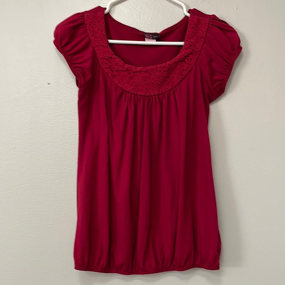 Red short sleeve shirt. Size medium